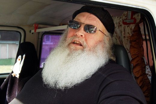 Cottageville Mayor Tim Grimsley, sitting in his 1983 VW van outside town hall Thursday afternoon, says a multi-million-dollar jury award is too “astronomical” to take seriously.